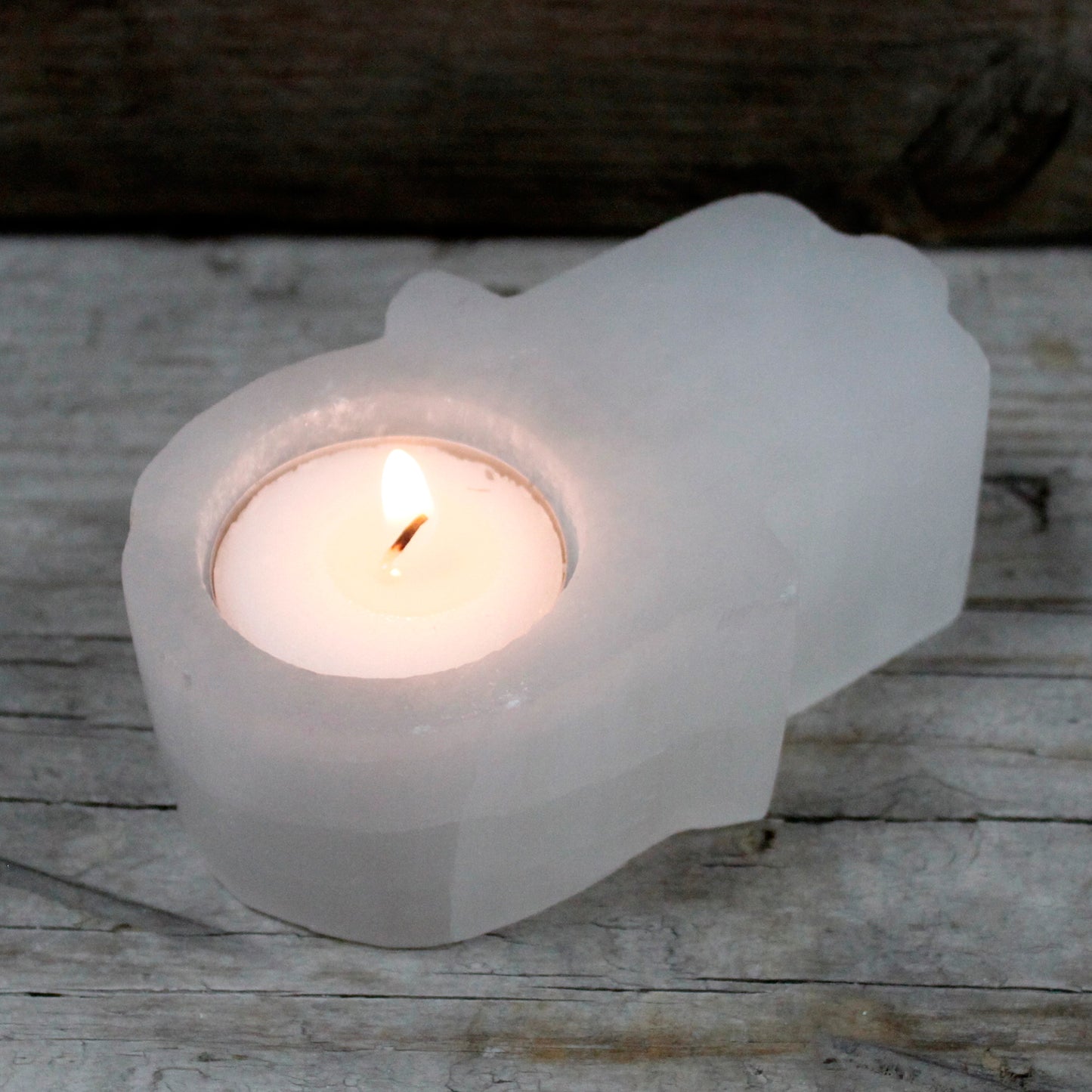 Selenite Hamsa Candle Holder - ScentiMelti  Selenite Hamsa Candle Holder