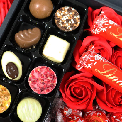 Lindt Lindor Ultimate Gift Hamper With Red Roses - ScentiMelti  Lindt Lindor Ultimate Gift Hamper With Red Roses